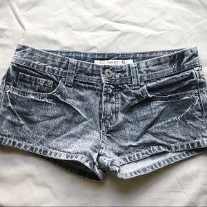 Acid washed jean shorts.